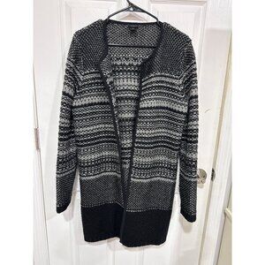 This is an Ann Taylor black and white striped cardigan sweater Size M